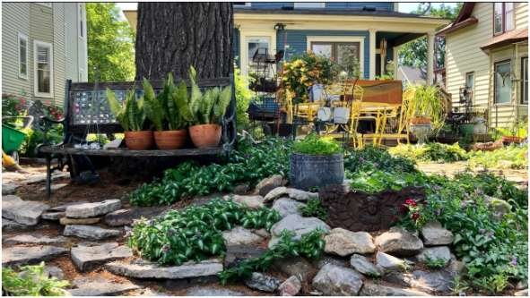 What visual tricks make Outdoor renovation for small yards look expensive?